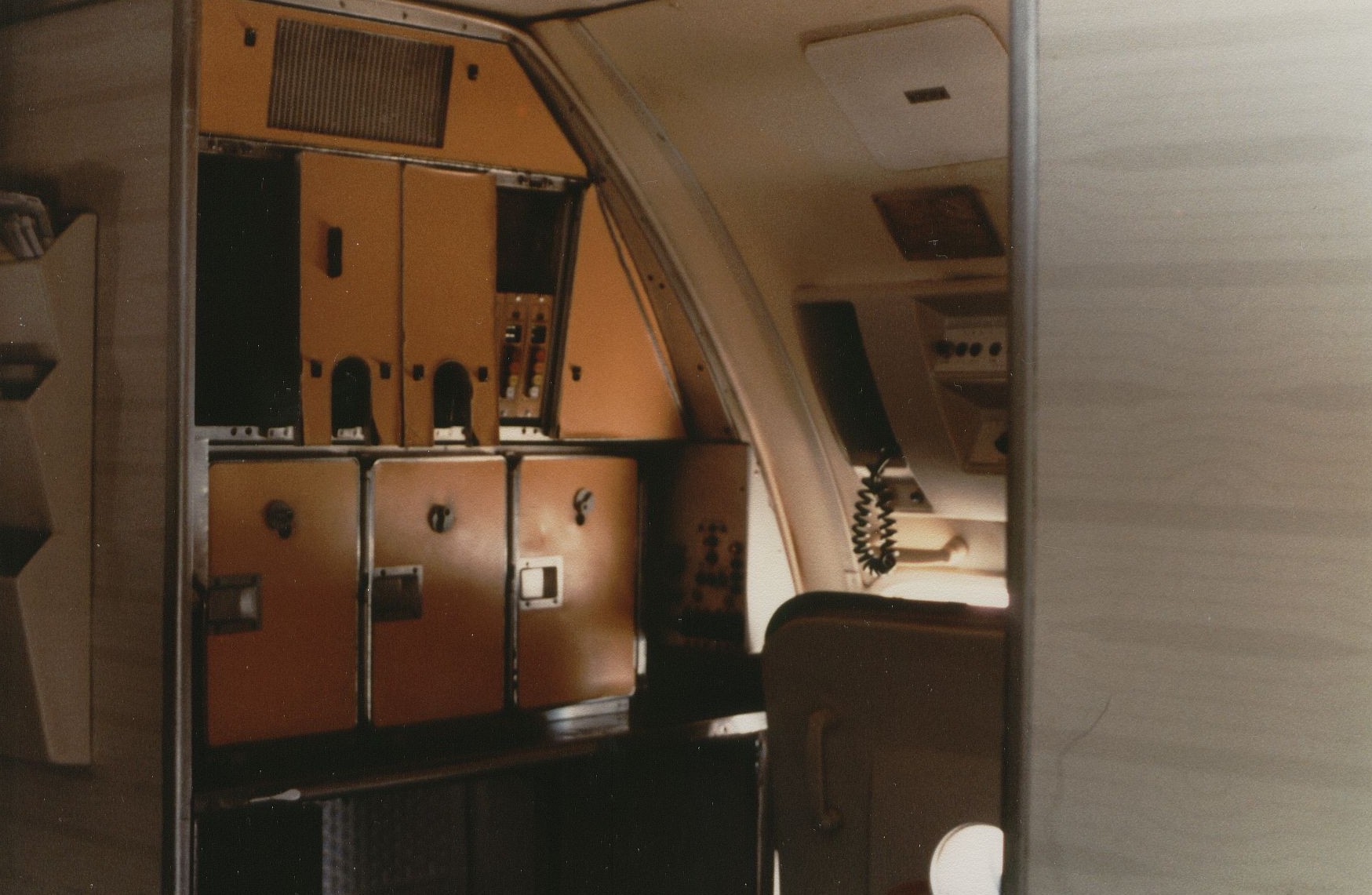 August 1981 The rear galley of a Pan Am Boeing 707 with the galley service door slightly ajar.